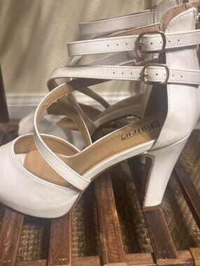 White strappy high heels